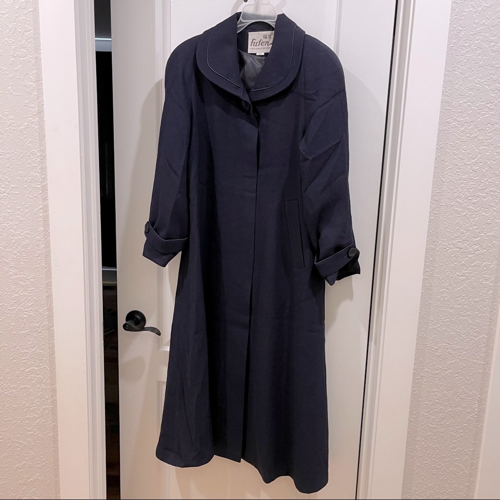 Shoulder padded retro style long coat